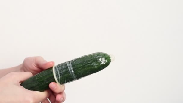 Woman Removes Condom Cucumber Instructional Video — Vídeos de Stock