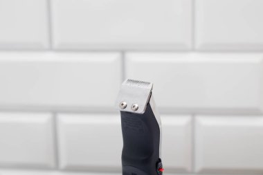 Beard and mustache trimmer in the bathroom.