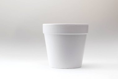 White clay planter on white background.