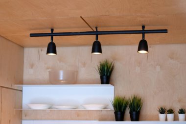 Track metal lamps in the loft interior.