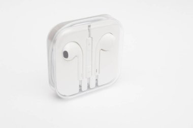 White wired headphones in the case