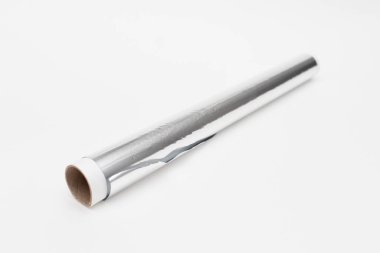 Aluminum foil roll on white background