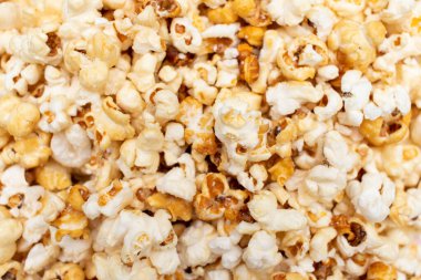 Popcorn texture background. Yellow sweet popcorn texture