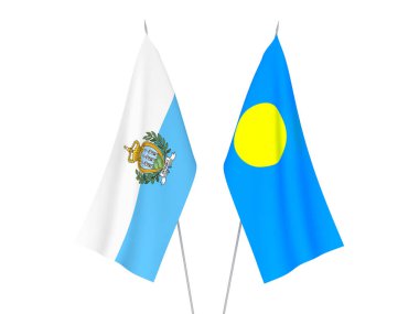 Beyaz arka planda Palau ve San Marino 'nun ulusal kumaş bayrakları izole edildi. 3d resimleme.