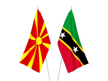 Beyaz arka planda Kuzey Makedonya ve Saint Christopher Federasyonu ve Nevis 'in ulusal kumaş bayrakları izole edildi. 3d resimleme.