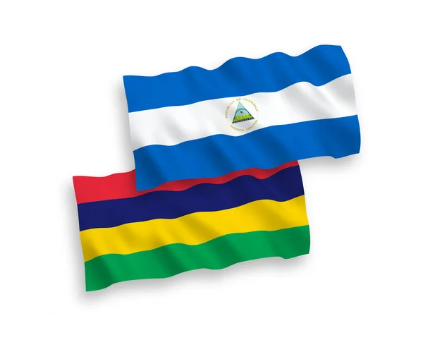 니카라과와 모리셔스 공화국의 국기들은 바탕에 게양되었다 — 스톡 벡터
