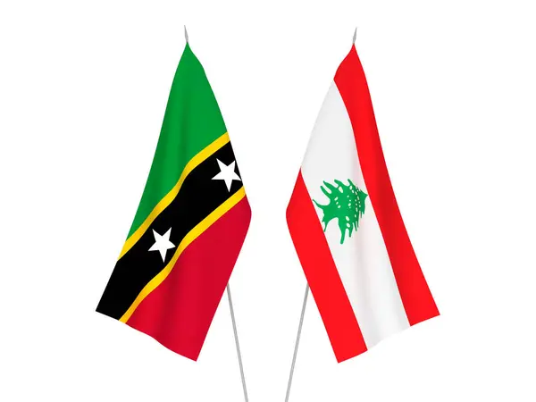 stock image National fabric flags of Lebanon and Federation of Saint Christopher and Nevis isolated on white background. 3d rendering illustration.