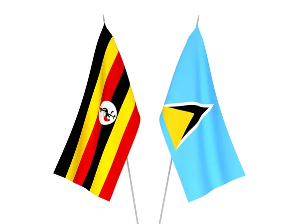 stock image National fabric flags of Uganda and Saint Lucia isolated on white background. 3d rendering illustration.