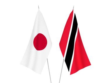Beyaz arka planda Japonya ve Trinidad Cumhuriyeti ve Tobago 'nun ulusal kumaş bayrakları izole edildi. 3d resimleme.