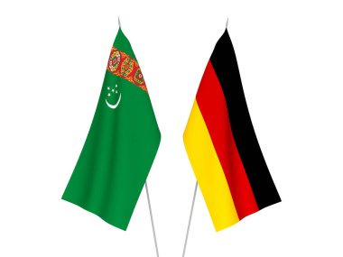 National fabric flags of Germany and Turkmenistan isolated on white background. 3d rendering illustration.