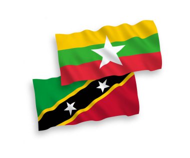 National vector fabric wave flags of Federation of Saint Christopher and Nevis and Myanmar isolated on white background. 1 to 2 proportion.