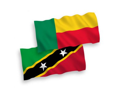 National vector fabric wave flags of Federation of Saint Christopher and Nevis and Benin isolated on white background. 1 to 2 proportion.