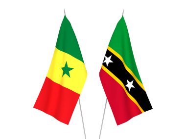 National fabric flags of Federation of Saint Christopher and Nevis and Republic of Senegal isolated on white background. 3d rendering illustration.