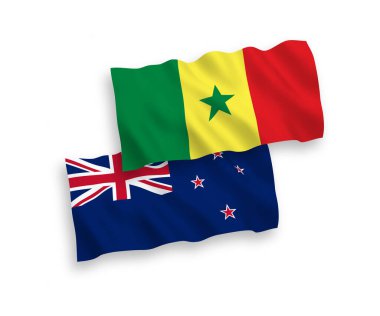National vector fabric wave flags of Republic of Senegal and New Zealand isolated on white background. 1 to 2 proportion.