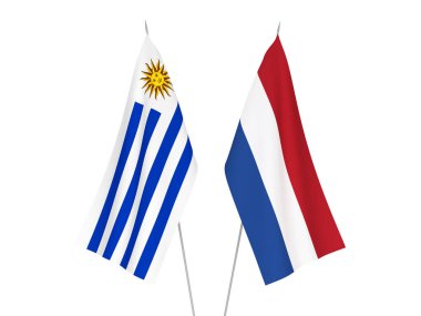 National fabric flags of Netherlands and Oriental Republic of Uruguay isolated on white background. 3d rendering illustration.