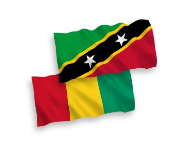 National vector fabric wave flags of Federation of Saint Christopher and Nevis and Guinea isolated on white background. 1 to 2 proportion.