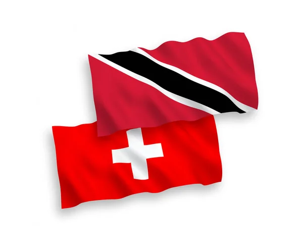 stock vector National vector fabric wave flags of Republic of Trinidad and Tobago and Switzerland isolated on white background. 1 to 2 proportion.