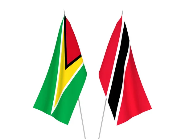 stock image National fabric flags of Republic of Trinidad and Tobago and Co-operative Republic of Guyana isolated on white background. 3d rendering illustration.