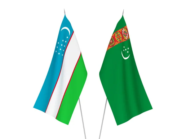 Bandeiras Tecido Nacional Uzbequistão Turquemenistão Isoladas Fundo Branco Ilustração Renderização — Fotografia de Stock