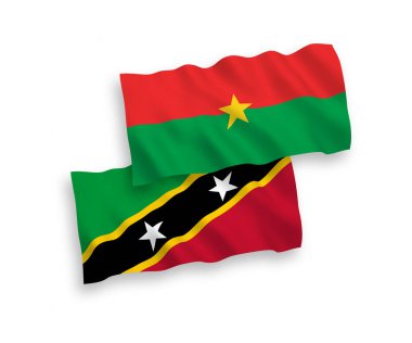 Beyaz arka planda Saint Christopher ve Nevis Federasyonu ve Burkina Faso 'nun ulusal taşıyıcı kumaş bayrakları izole edildi. 1 'e 2 oranında.