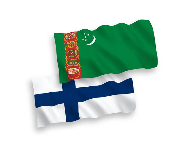 stock vector National vector fabric wave flags of Finland and Turkmenistan isolated on white background. 1 to 2 proportion.