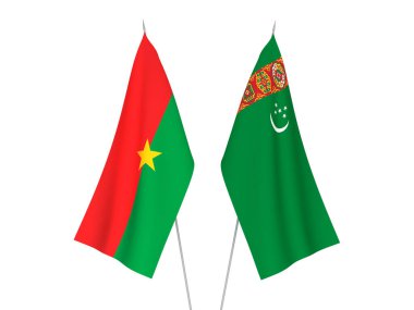Beyaz arka planda Türkmenistan ve Burkina Faso 'nun ulusal kumaş bayrakları izole edildi. 3d resimleme.