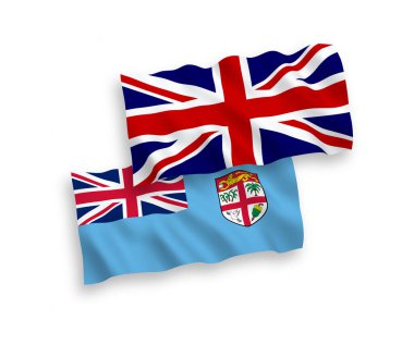 Beyaz arka planda Büyük Britanya ve Fiji Cumhuriyeti 'nin ulusal taşıyıcı kumaş bayrakları izole edildi. 1 'e 2 oranında.