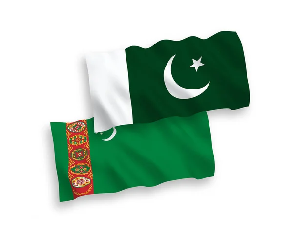 Nationell Vektor Tyg Våg Flaggor Turkmenistan Och Pakistan Isolerad Vit — Stock vektor