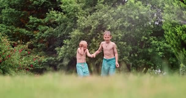 Kids Play Water Hot Summer Day Children Garden Sprinkler Having — Video Stock