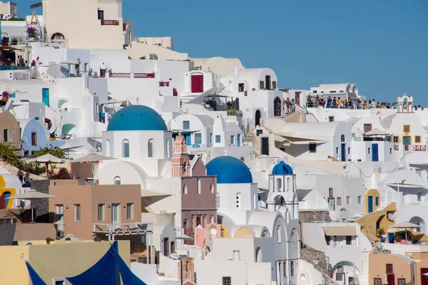 stock image Oia Santorini Greece -24 September 2022: View of Oia Town with Blue Domed Churches