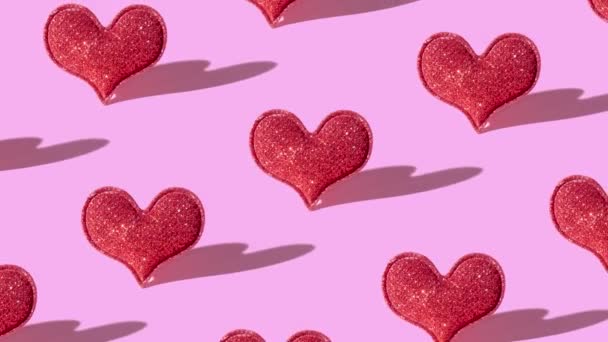 Padrão Com Forma Coração Brilho Vermelho Fundo Rosa Com Sombra — Vídeo de Stock