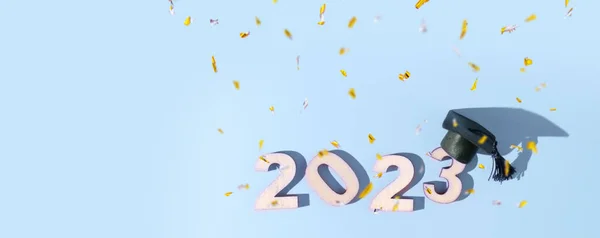 2023 sınıfı konsepti. Renkli arka planda siyah şapkalı 2023 numara..