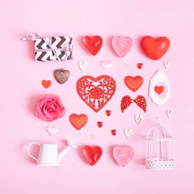 Many differente hearts and valentines day symbols elements top view. Creative valentines day flat lay background.