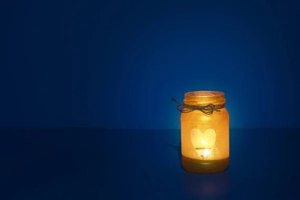 Glass Jar Candle Flame Shape Heart Dark — Zdjęcie stockowe