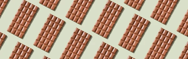 Padrão Barra Chocolate Flat Lay Vista Superior Sobre Fundo Verde — Fotografia de Stock