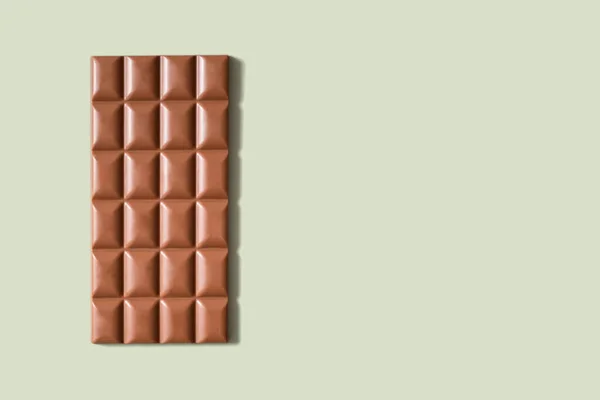 Bar Chocolate Plano Vista Superior Sobre Fondo Verde Pastel Con — Foto de Stock