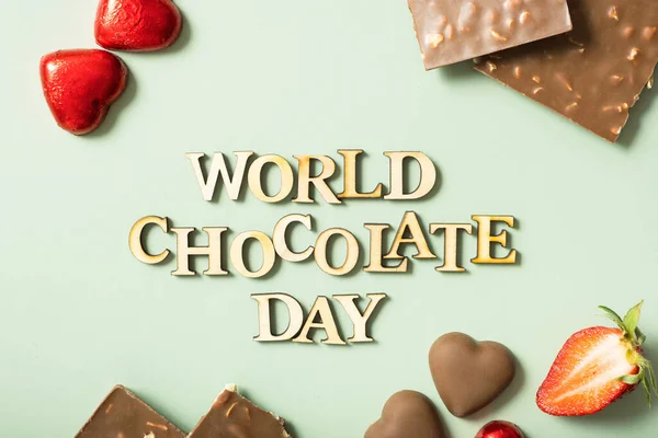 World Chocolate Day Text Chocolate Flat Lay Top View Pastel — Stock Photo, Image