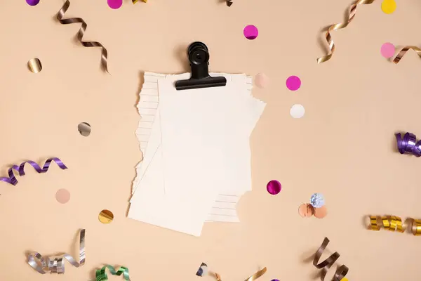 Blank sheet paper. Empty paper sheet with festive confetti and spirals.
