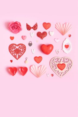 Valentines day pattern background. Many differente hearts and valentines day symbols elements top view.