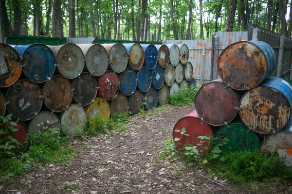 stock image Polygon for playing paintball with old rusty barrels