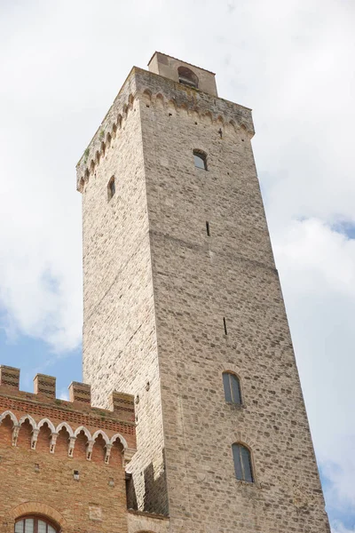 stock image Belltower of the Cathedral of San Gimignano, a symbol of one of Tuscany's most picturesque medieval hill towns. Beautiful architecture and a major tourist attraction.