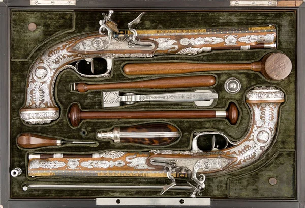Cased Pair Ancient Flintlock Pistols Accessories 19Th Century Top View Fotos de stock libres de derechos
