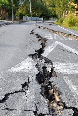 February 24, 2011: The streets of Avonside, Christchurch, New Zealand are shaken to pieces by a devasting 7.3 earthquake. Over 95 deaths have resulted. clipart