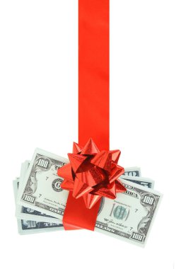 Beyaz şeffaf arka planda izole edilmiş para hediyesi, Amerikan doları yığını ve kırmızı fiyonk, neşeli bir hediye..