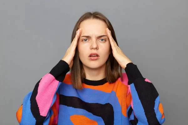 Indoor Shot Sad Unhappy Shocked Woman Wearing Colorful Sweater Posing — Stock Photo, Image