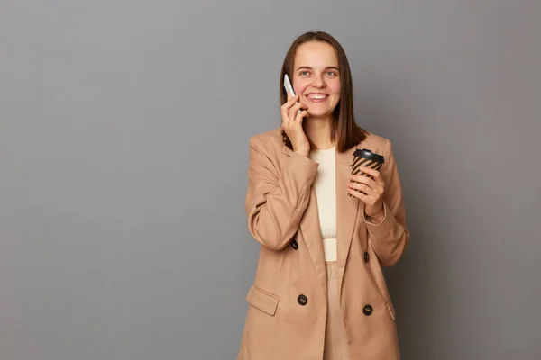 Image Young Smiling Happy Woman Beige Suit Using Mobile Cell — Photo