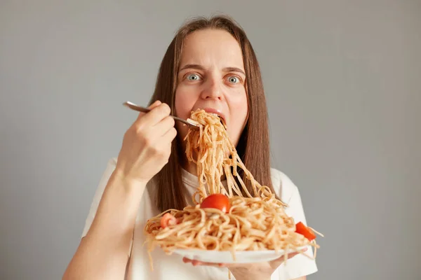 Hungry Woman Wearing White Shirt Eating Delicious Spaghetti Having Dinner — Stockfoto