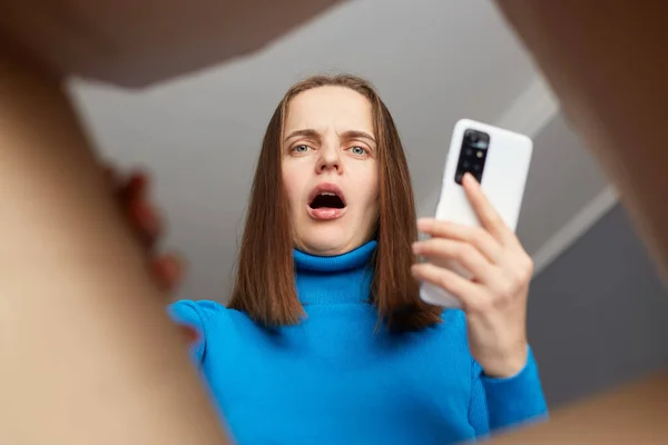 Astonished Caucasian Young Adult Woman Wearing Blue Turtleneck Opening Carton — Stock Photo, Image