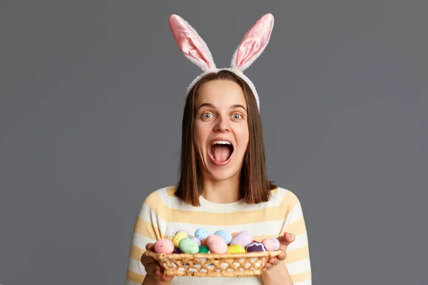 Image Amazed Excited Positive Adorable Woman Wearing Rabbit Ears Holding — Stock Photo, Image