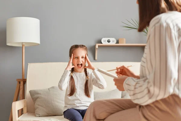 Despair Hysterical Child Sitting Sofa Screaming Holding Head Having Problems — Stock Photo, Image